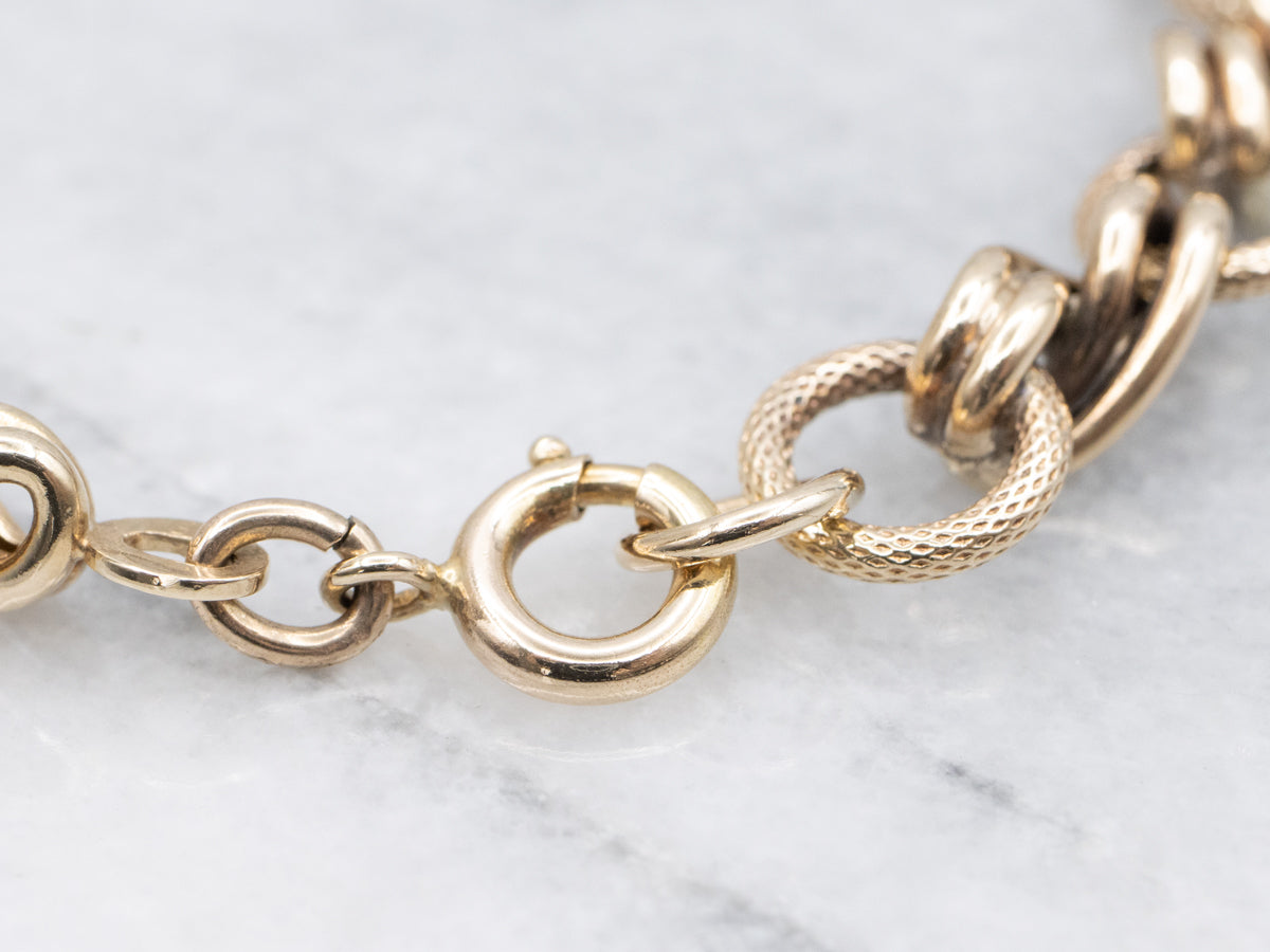 Antique Gold Textured and Twisting Link Bracelet