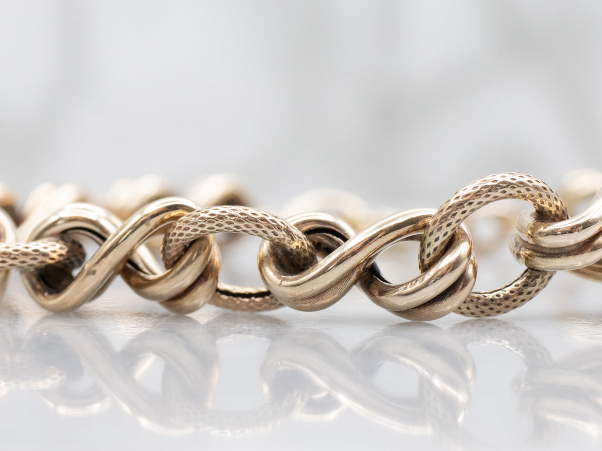 Antique Gold Textured and Twisting Link Bracelet