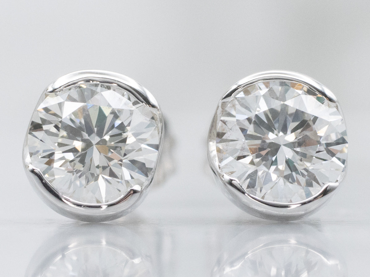 Round Brilliant Diamond Semi-Bezel Set Platinum Stud Earrings
