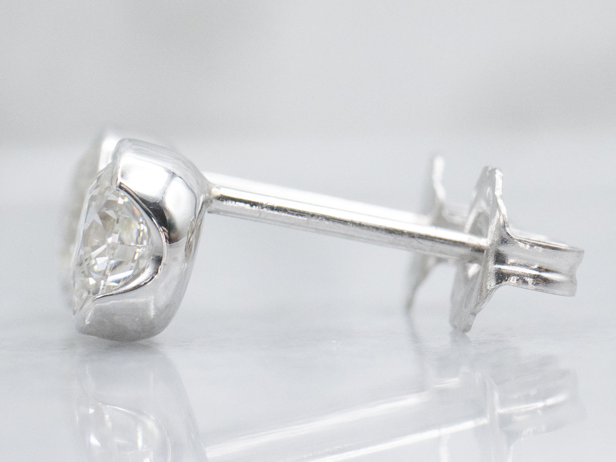 Round Brilliant Diamond Semi-Bezel Set Platinum Stud Earrings