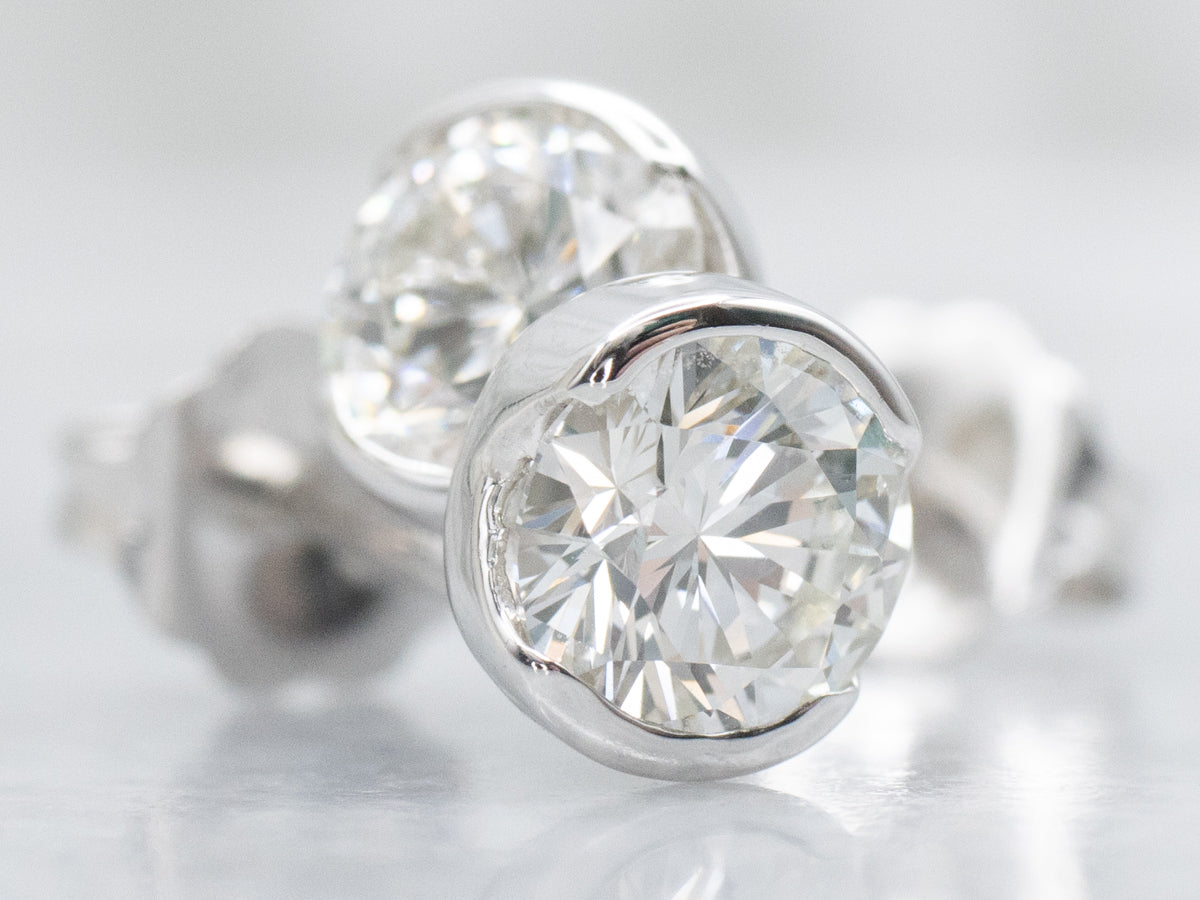 Round Brilliant Diamond Semi-Bezel Set Platinum Stud Earrings
