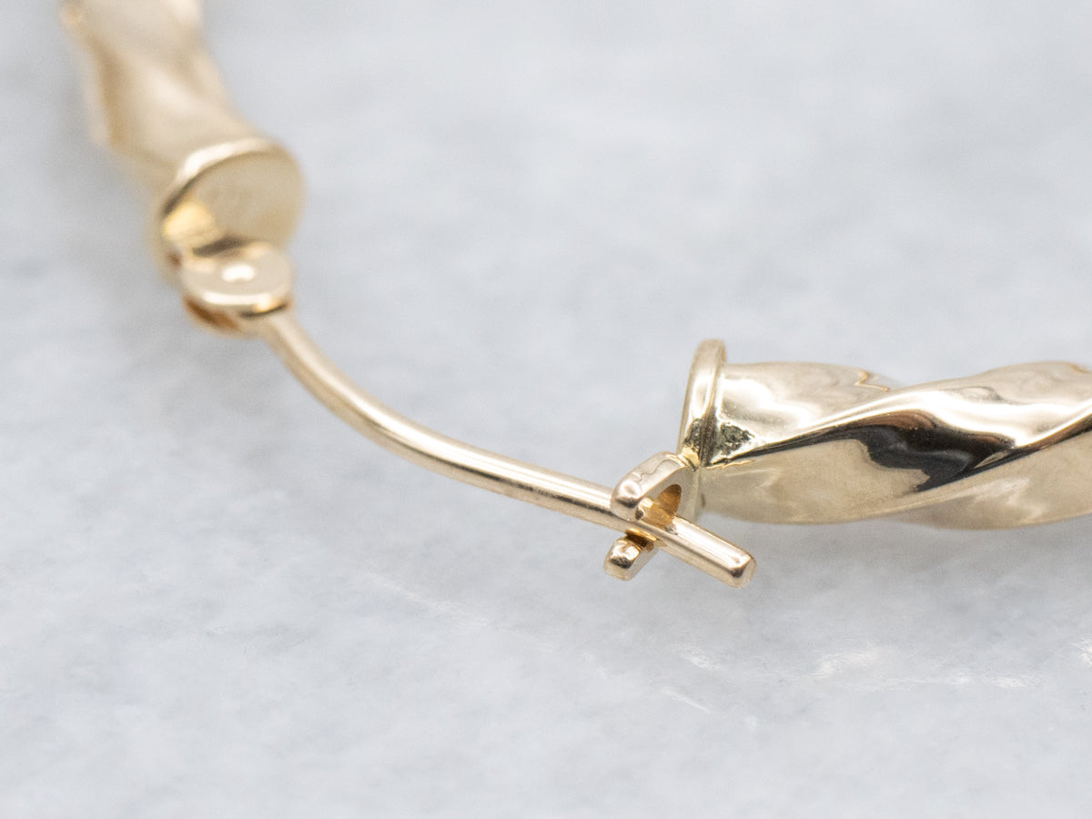 Twisted Yellow Gold Tube Hoop Earrings