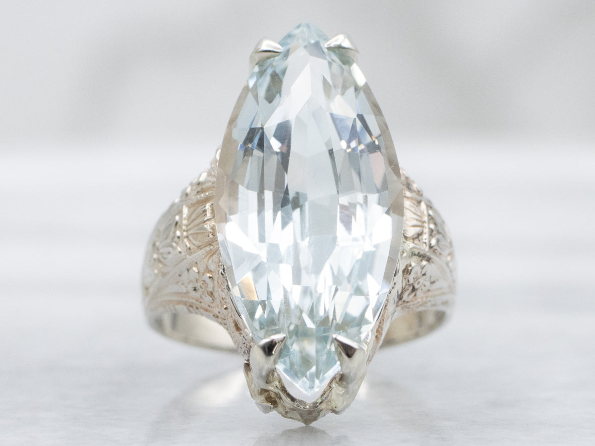 Antique Hand-Engraved Floral Ring with Marquise Blue Topaz