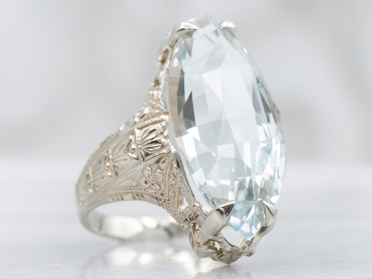 Antique Hand-Engraved Floral Ring with Marquise Blue Topaz