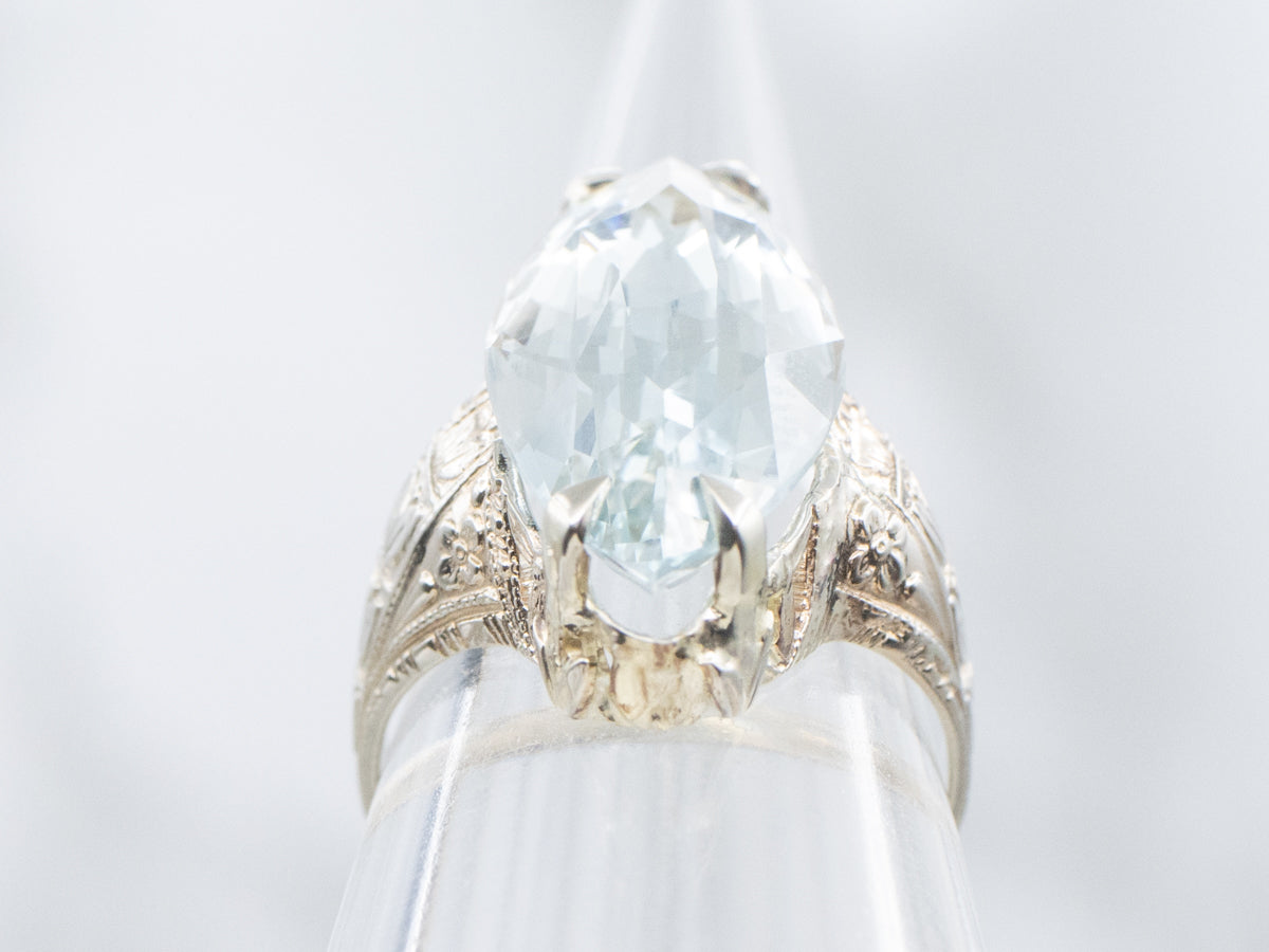 Antique Hand-Engraved Floral Ring with Marquise Blue Topaz