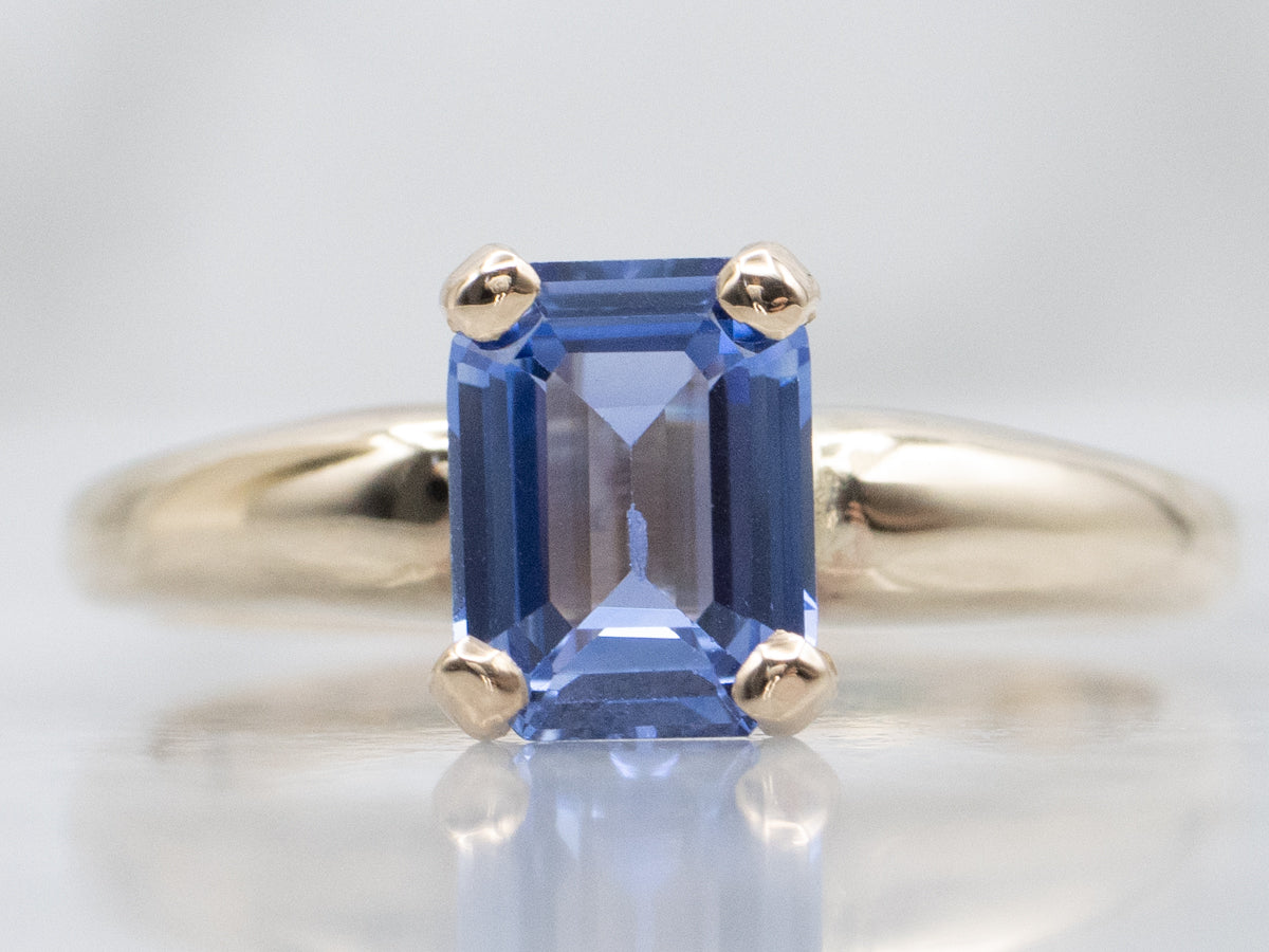 Emerald-Cut Blue Sapphire Solitaire Engagement Ring