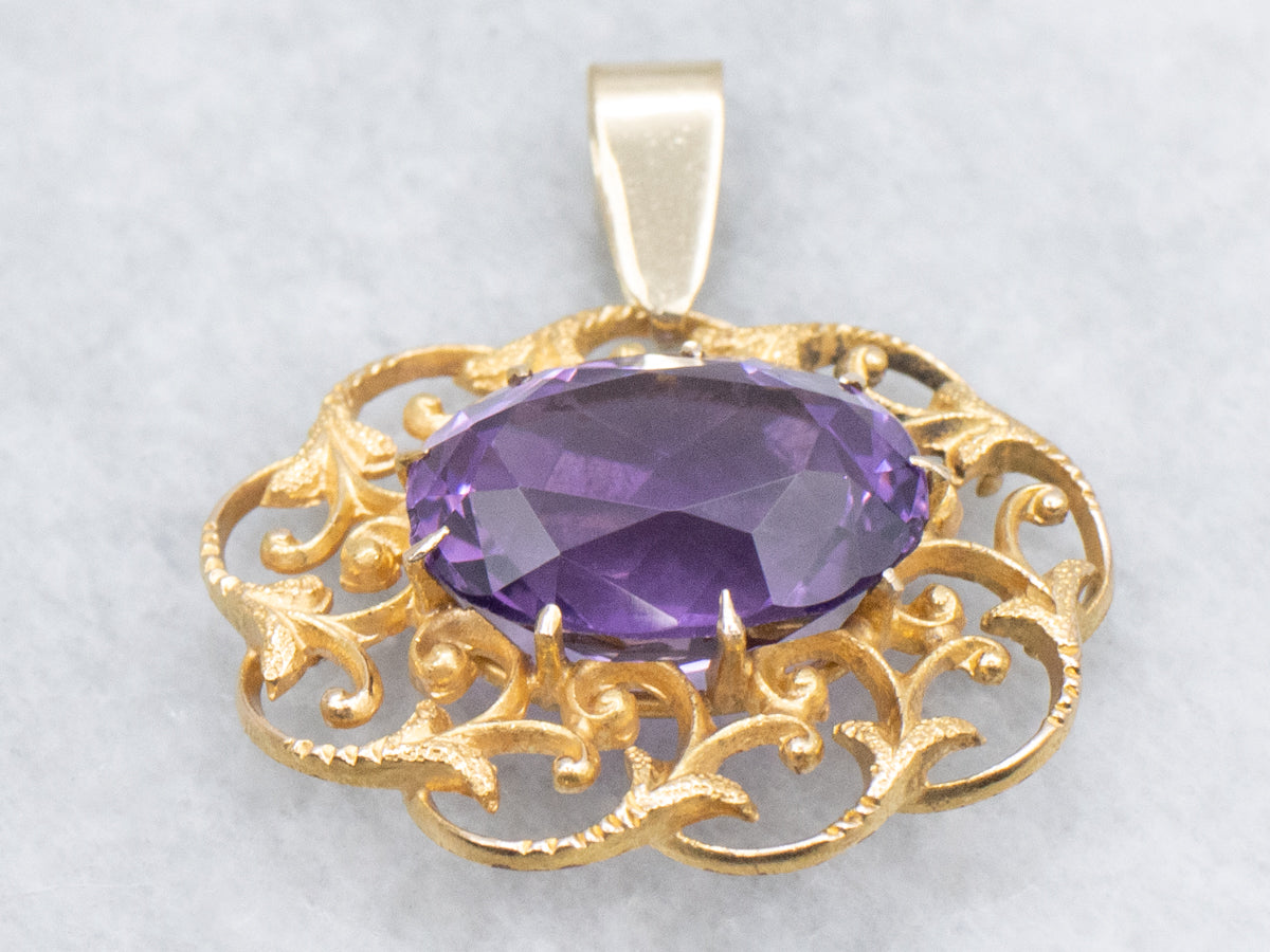 Ornate Amethyst and Scrolling Gold Filigree Pendant