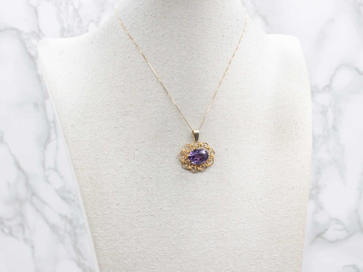 Ornate Amethyst and Scrolling Gold Filigree Pendant