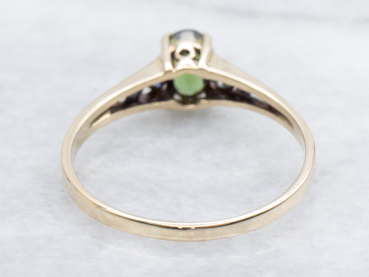 Scrolling Yellow Gold Green Tourmaline Solitaire Ring