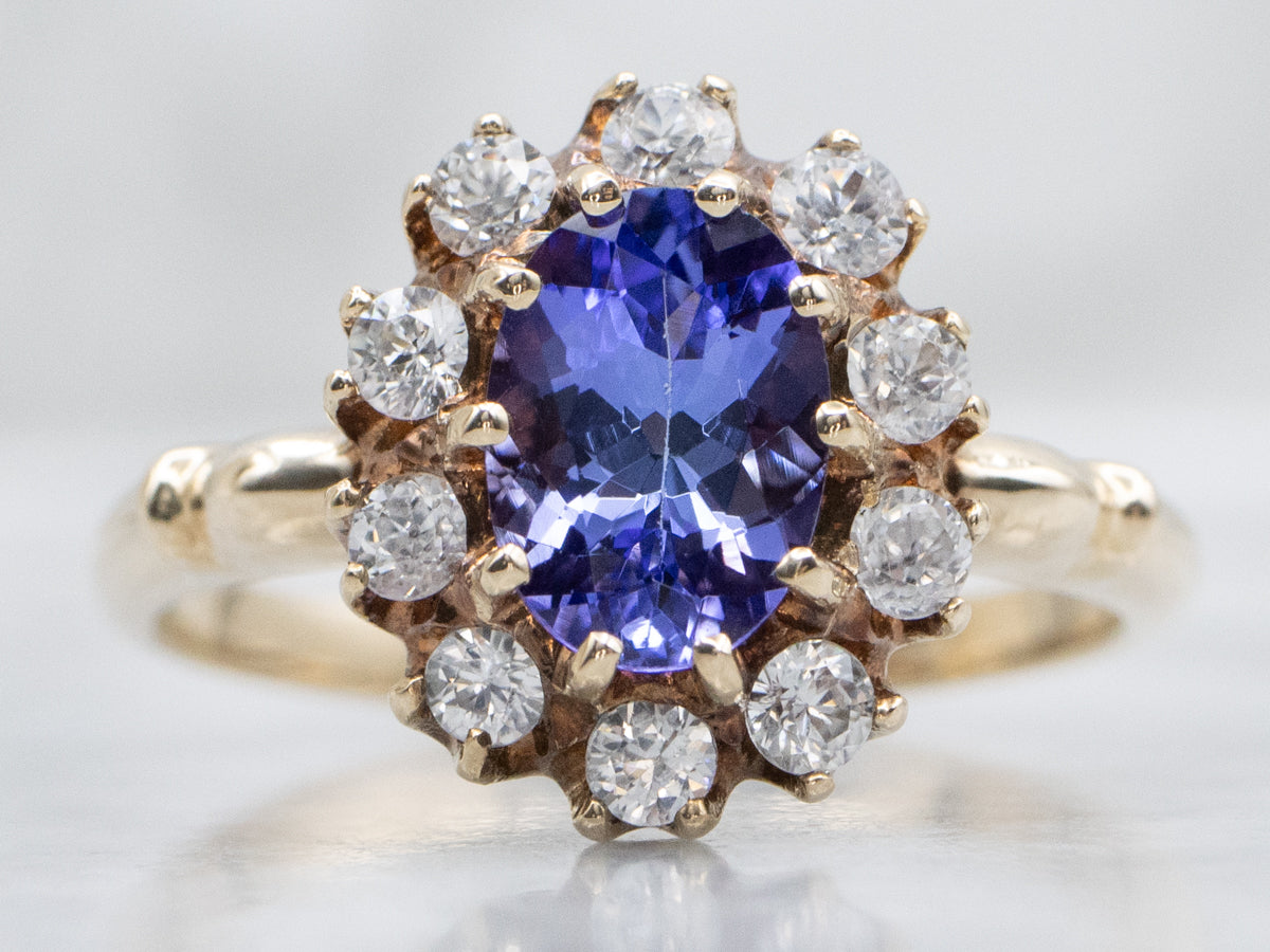 Vintage Tanzanite and Gold White Topaz Halo Ring