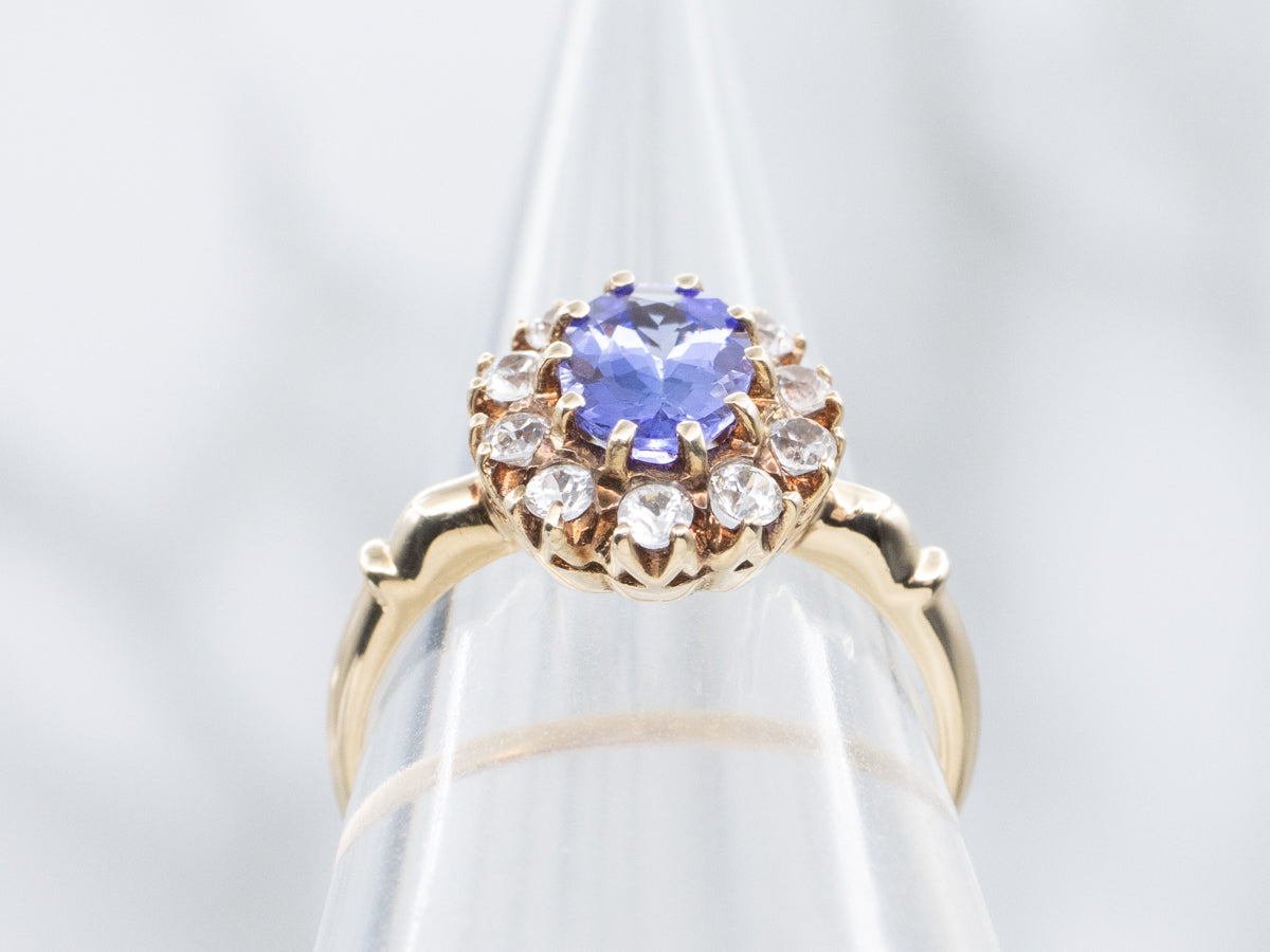 Vintage Tanzanite and Gold White Topaz Halo Ring