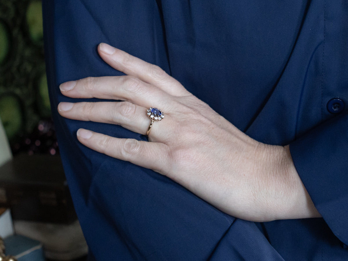 Vintage Tanzanite and Gold White Topaz Halo Ring