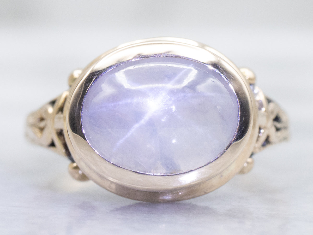 Floral East-to-West Bezel-Set Star Sapphire Gold Solitaire Ring