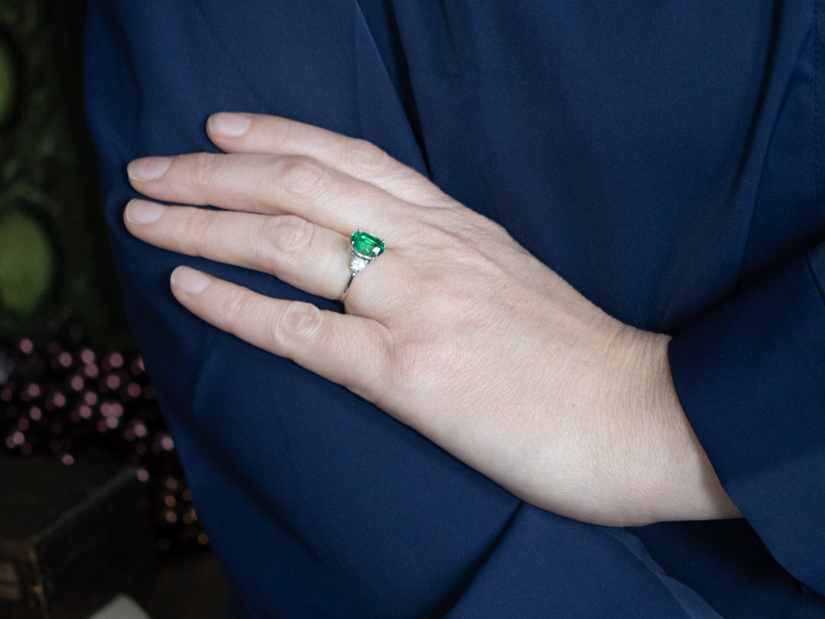 Modern Oval-Cut Emerald and Diamond Three Stone Ring