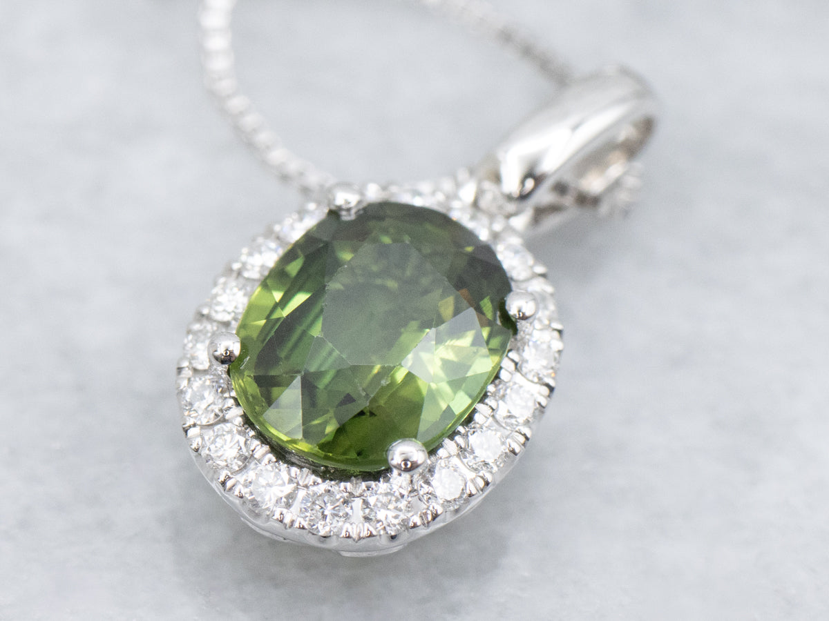 Modern Green Sapphire and Diamond Halo Pendant Necklace