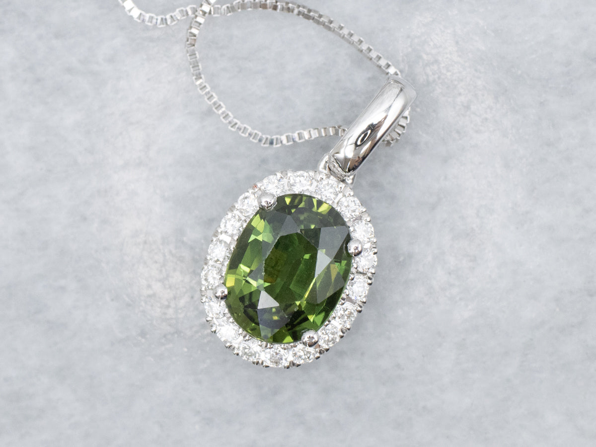 Modern Green Sapphire and Diamond Halo Pendant Necklace