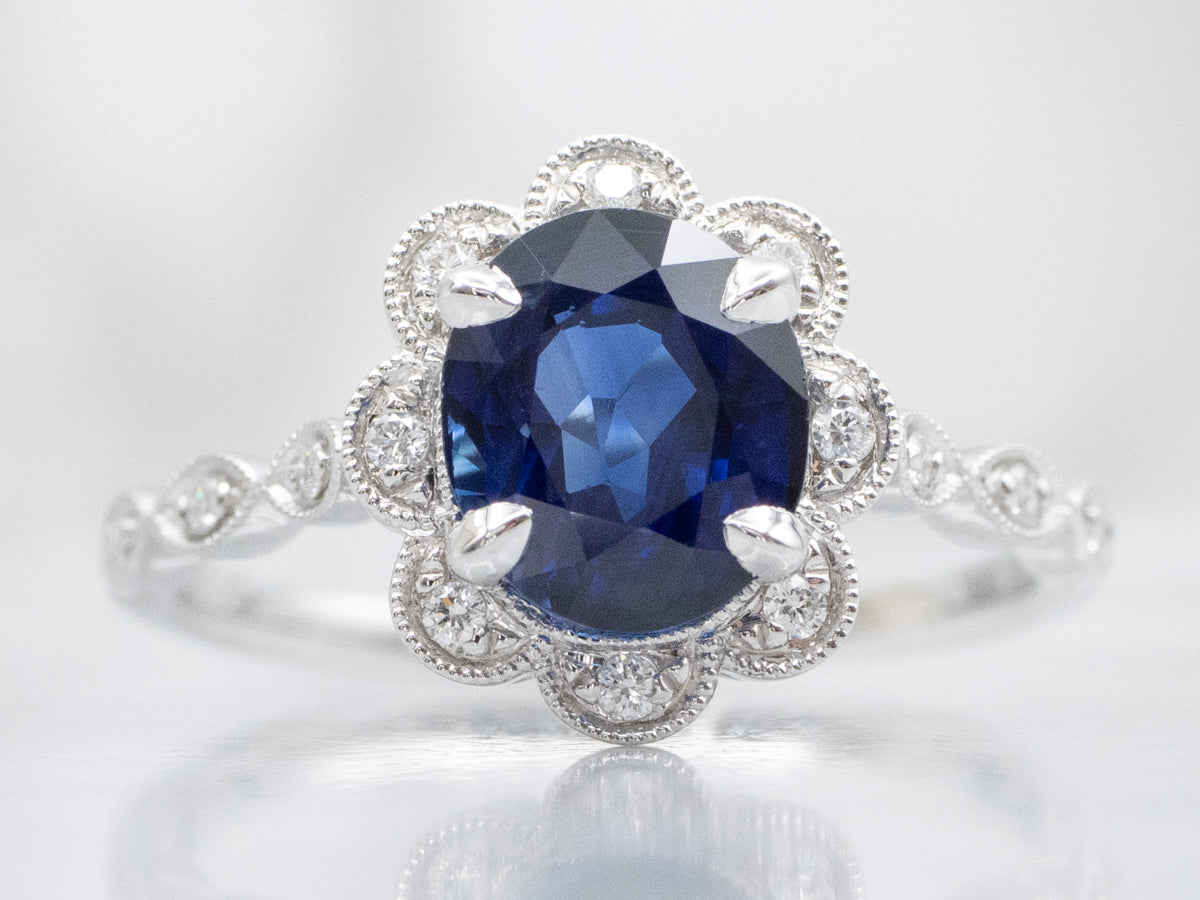Sapphire and Diamond Scalloped Halo Modern Ring