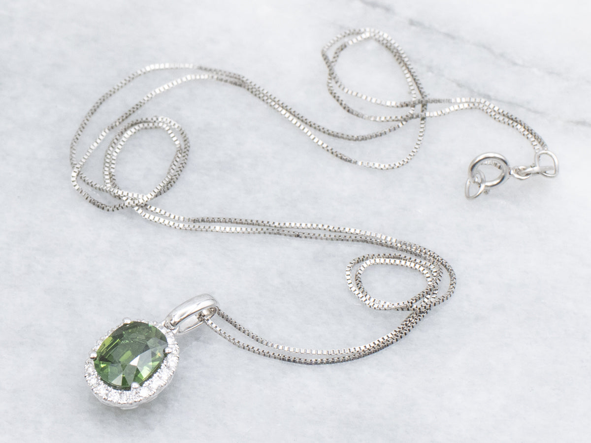 Modern Green Sapphire and Diamond Halo Pendant Necklace