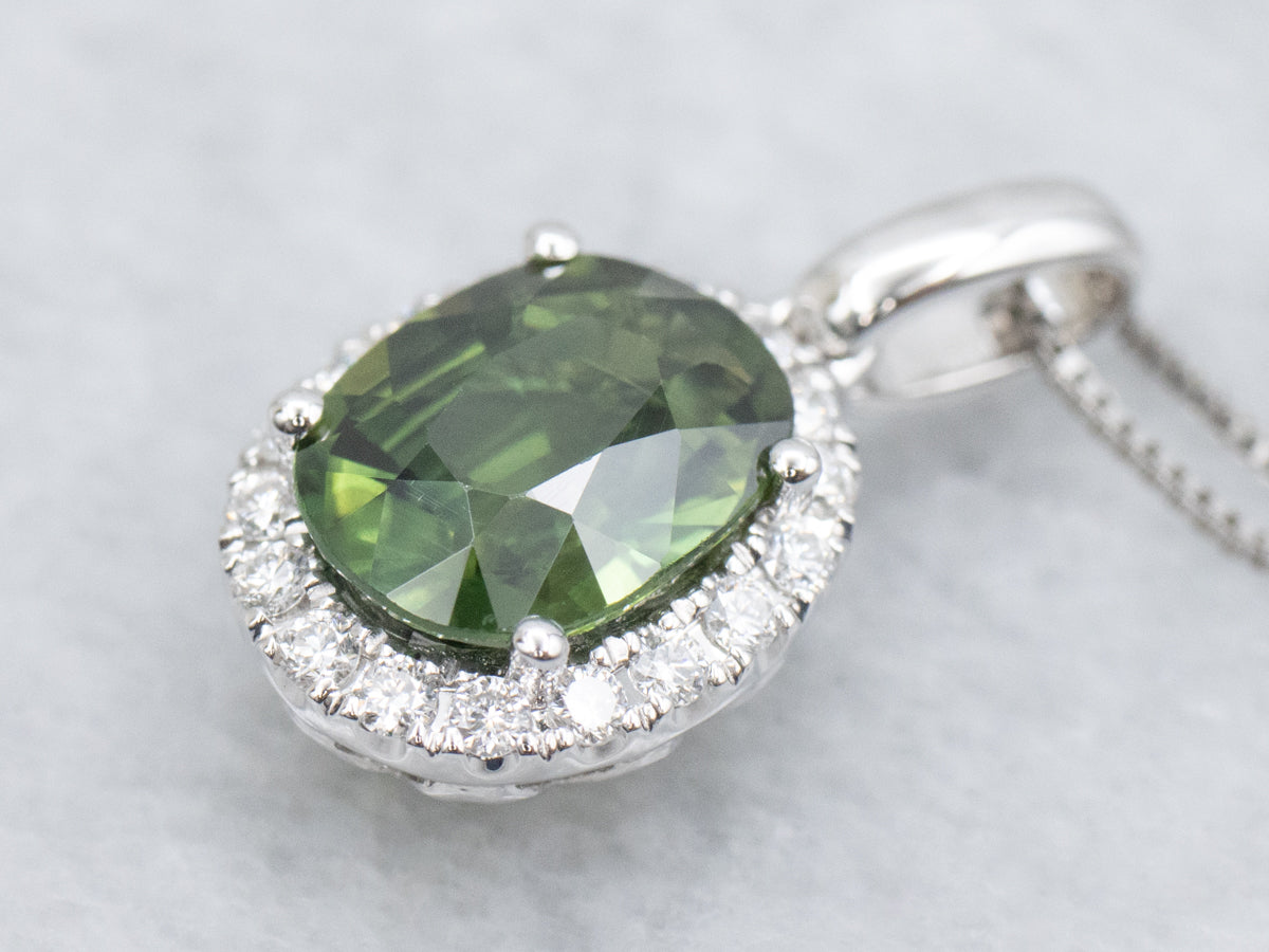Modern Green Sapphire and Diamond Halo Pendant Necklace