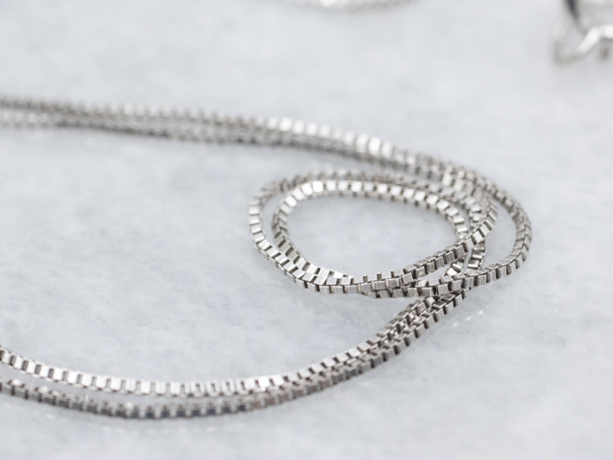 Modern Green Sapphire and Diamond Halo Pendant Necklace