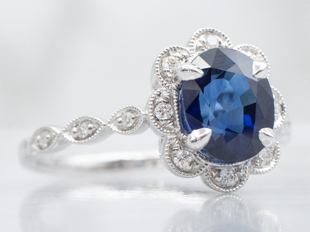 Sapphire and Diamond Scalloped Halo Modern Ring