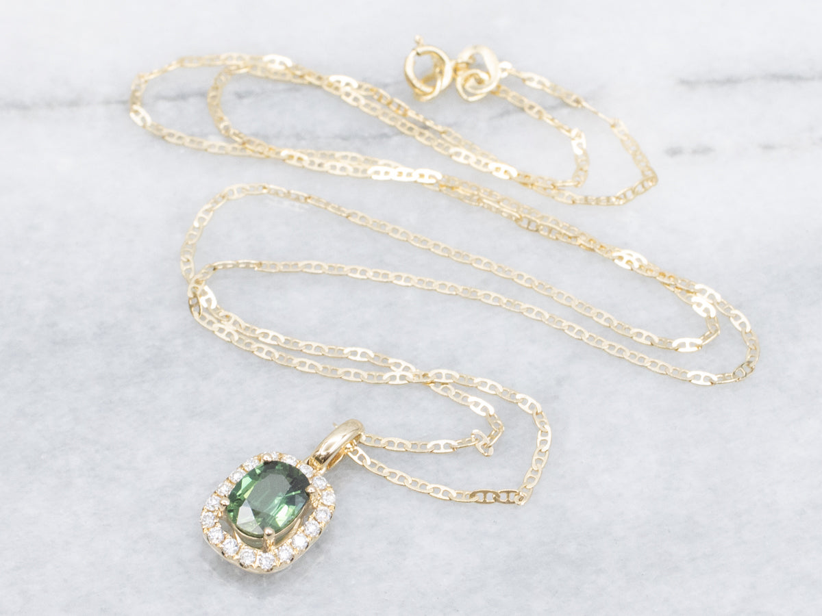 Modern Green Sapphire and Diamond Halo Pendant Necklace