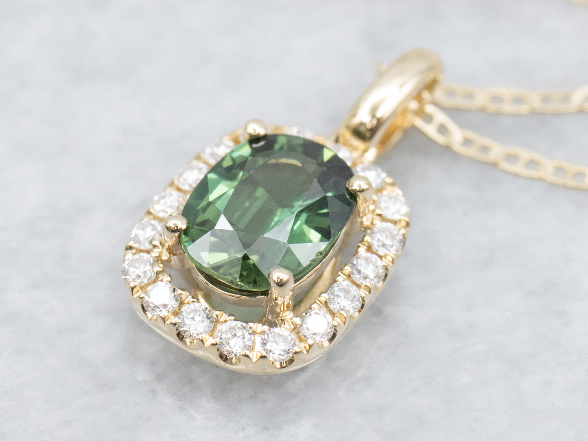 Modern Green Sapphire and Diamond Halo Pendant Necklace