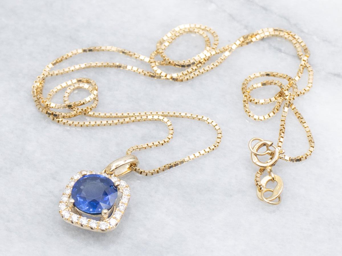 Modern Round-Cut Sapphire and Diamond Halo Pendant Necklace