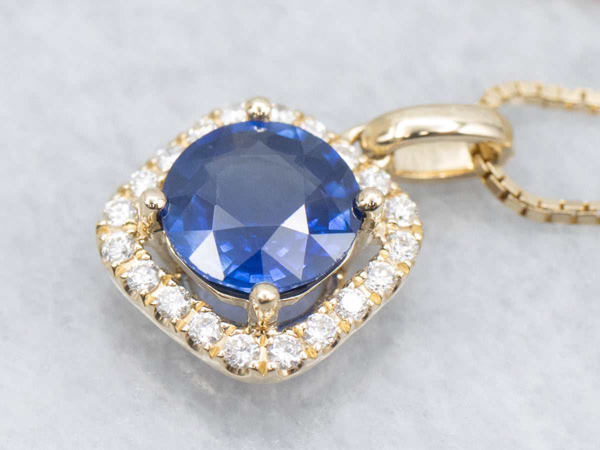 Modern Round-Cut Sapphire and Diamond Halo Pendant Necklace