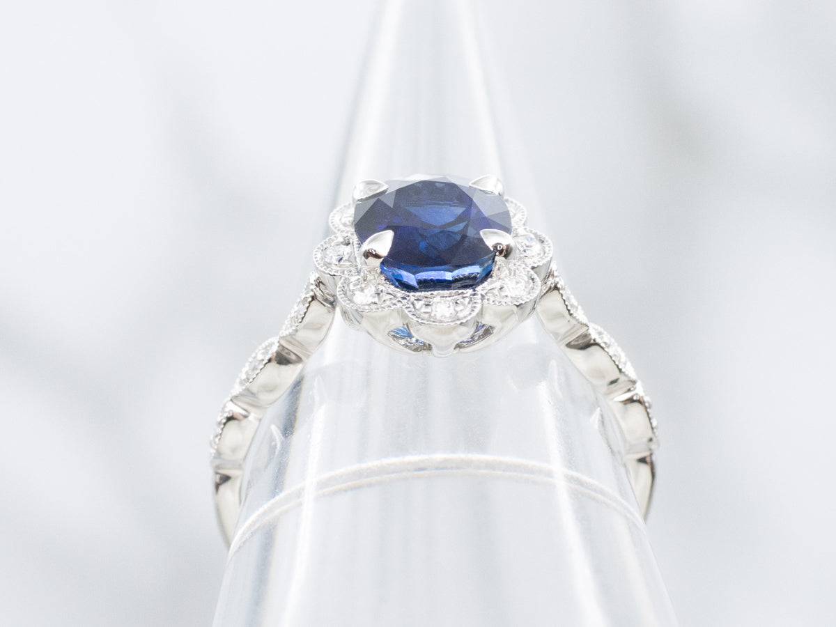 Sapphire and Diamond Scalloped Halo Modern Ring