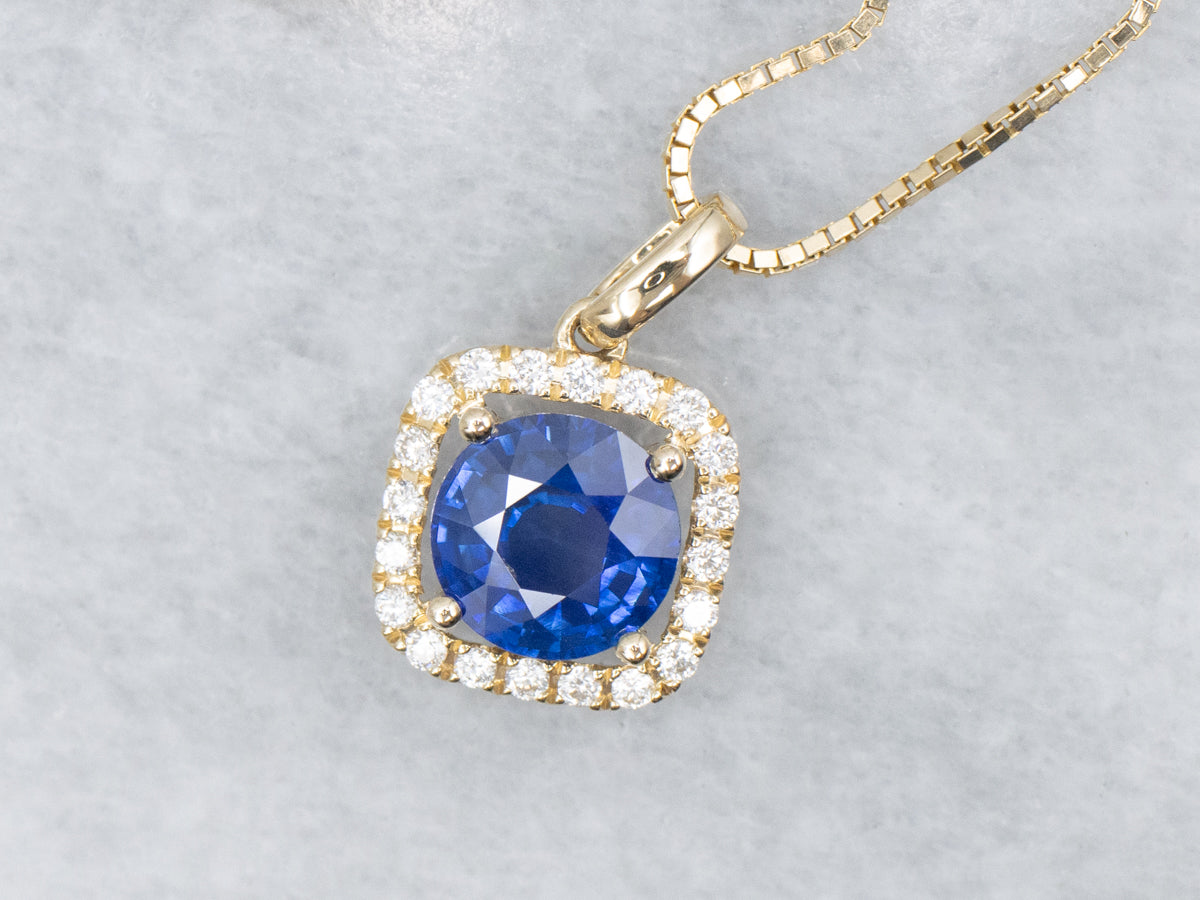 Modern Round-Cut Sapphire and Diamond Halo Pendant Necklace