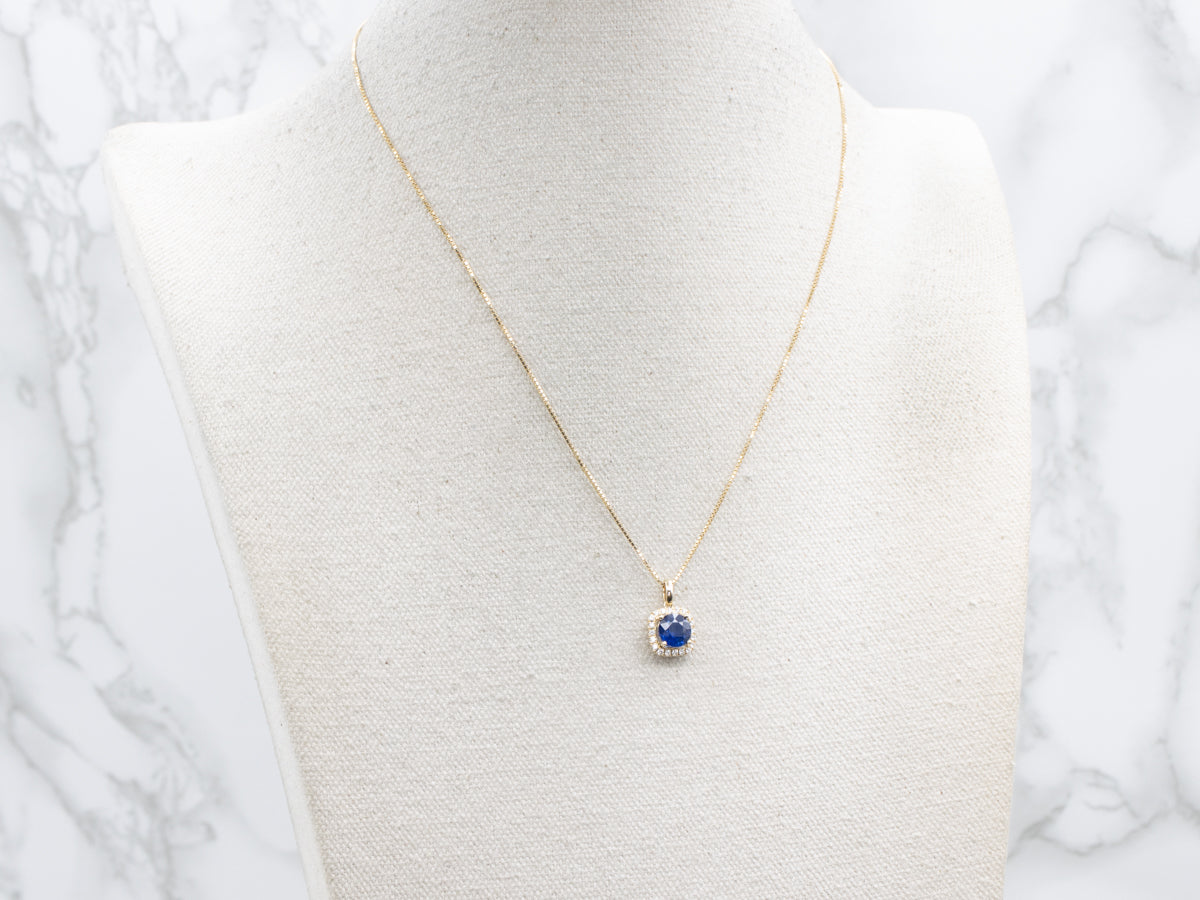 Modern Round-Cut Sapphire and Diamond Halo Pendant Necklace
