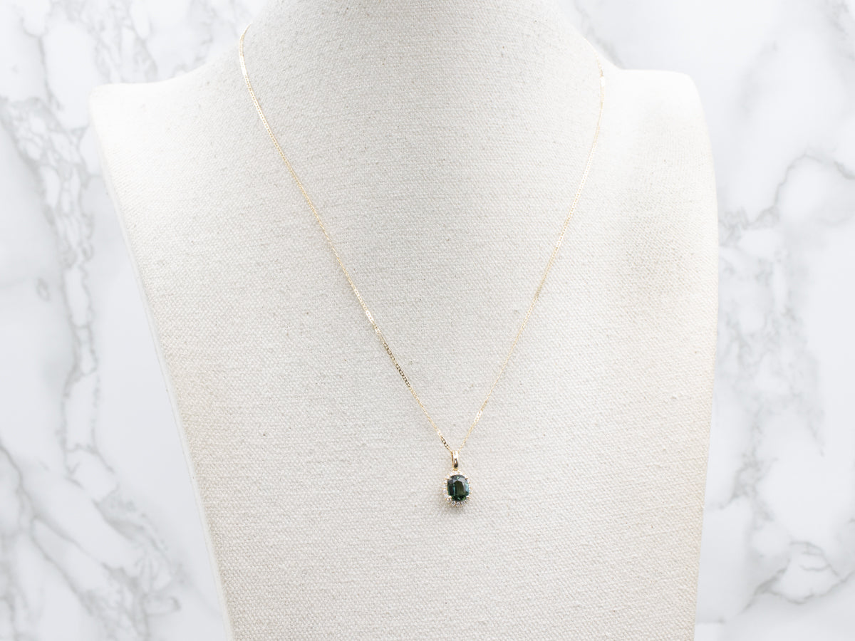 Blue-Green Sapphire and Diamond Halo Gold Pendant Necklace