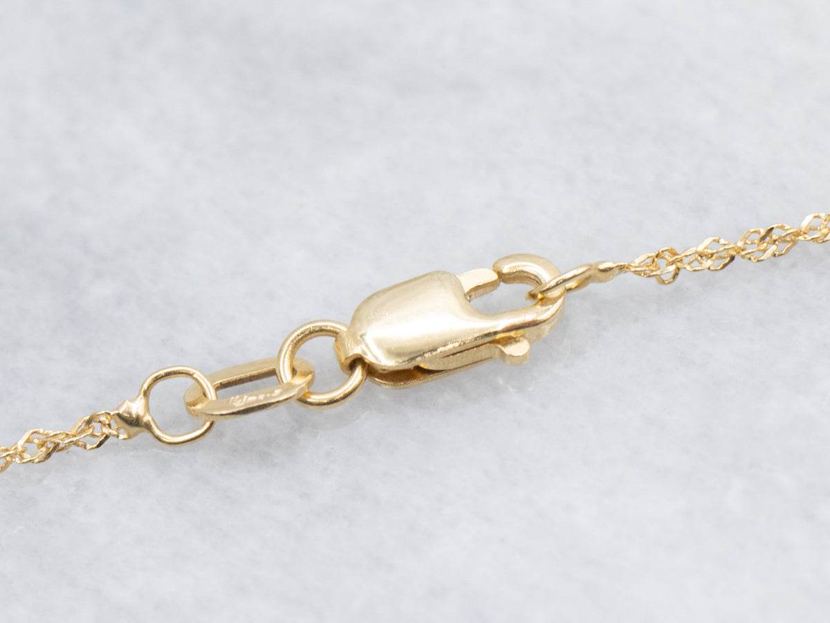 Modern Yellow Sapphire and Diamond Halo Pendant Necklace