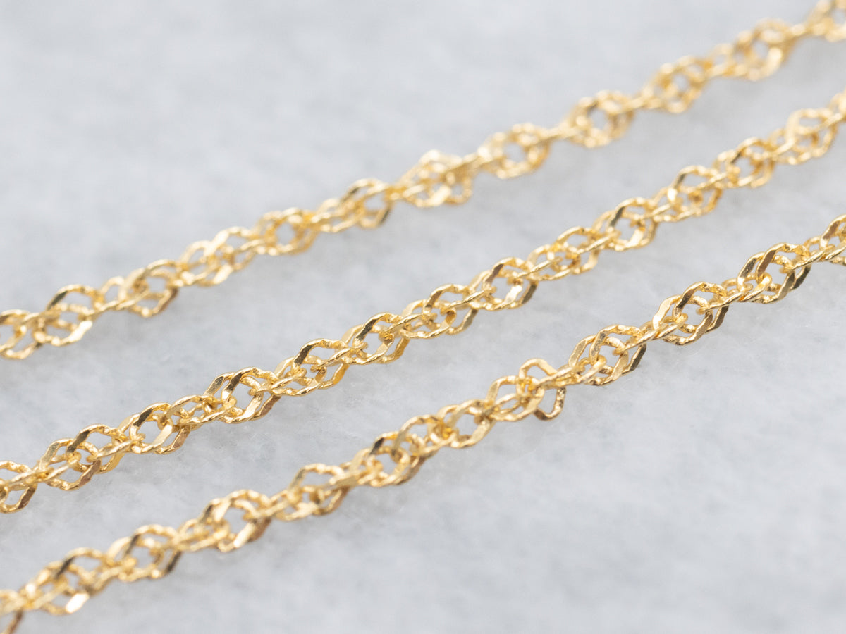 Modern Yellow Sapphire and Diamond Halo Pendant Necklace