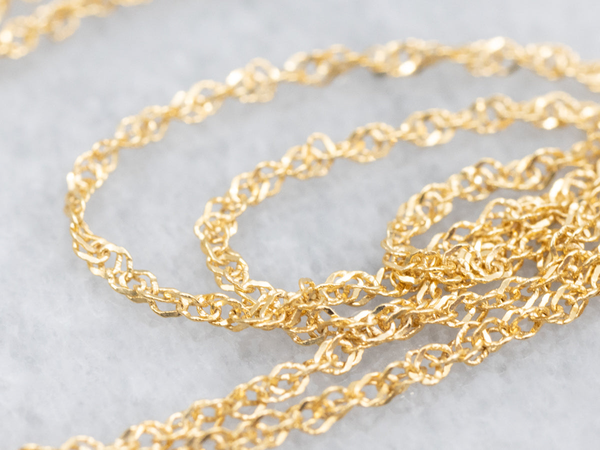 Modern Yellow Sapphire and Diamond Halo Pendant Necklace