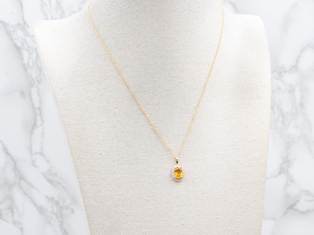 Modern Yellow Sapphire and Diamond Halo Pendant Necklace
