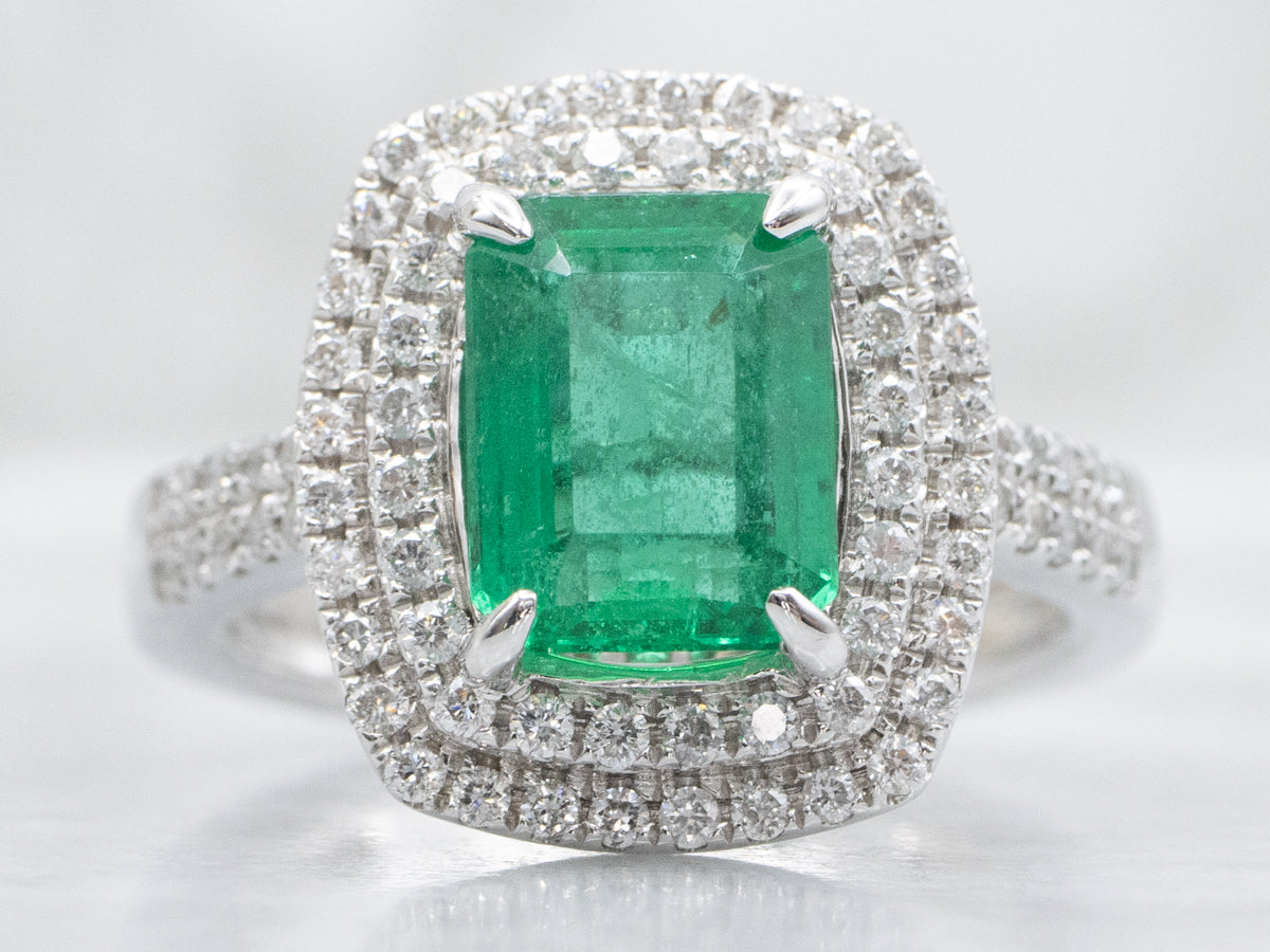 Modern Emerald and Double Diamond Halo White Gold Ring