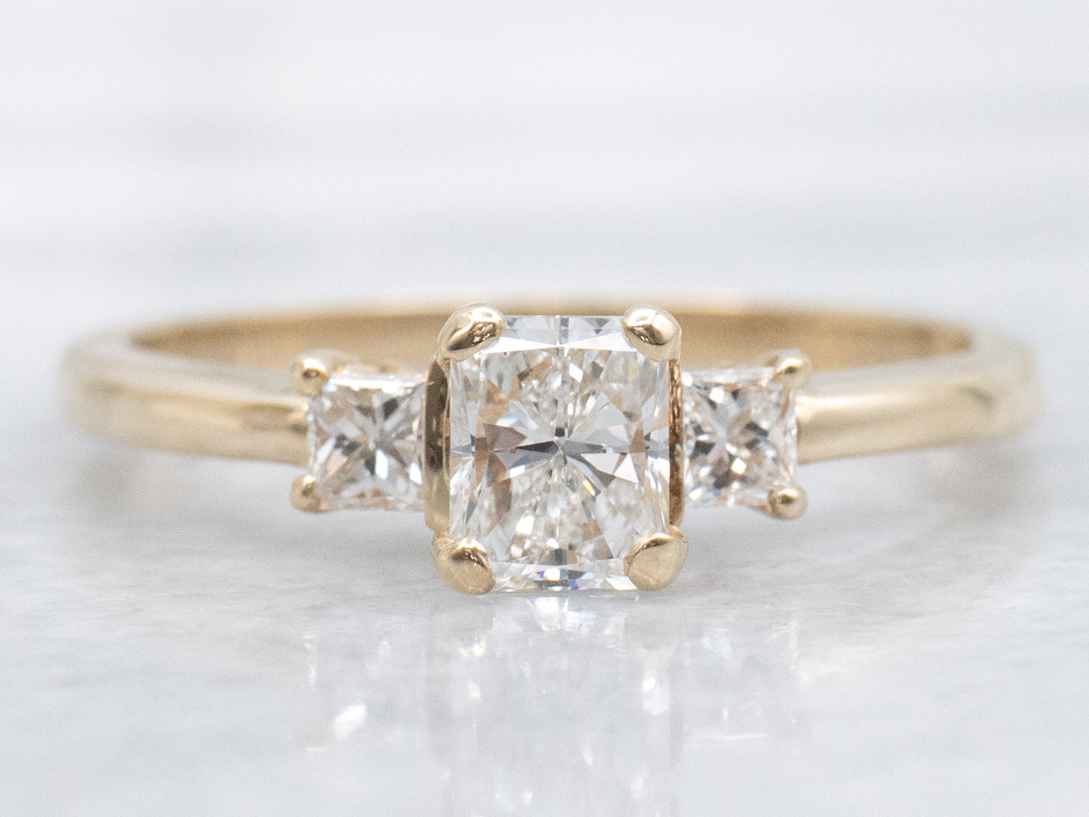 Emerald-Cut Diamond and Gold Engagement Ring