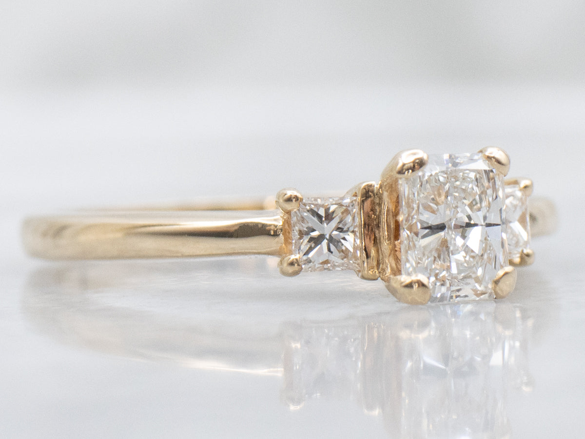 Emerald-Cut Diamond and Gold Engagement Ring