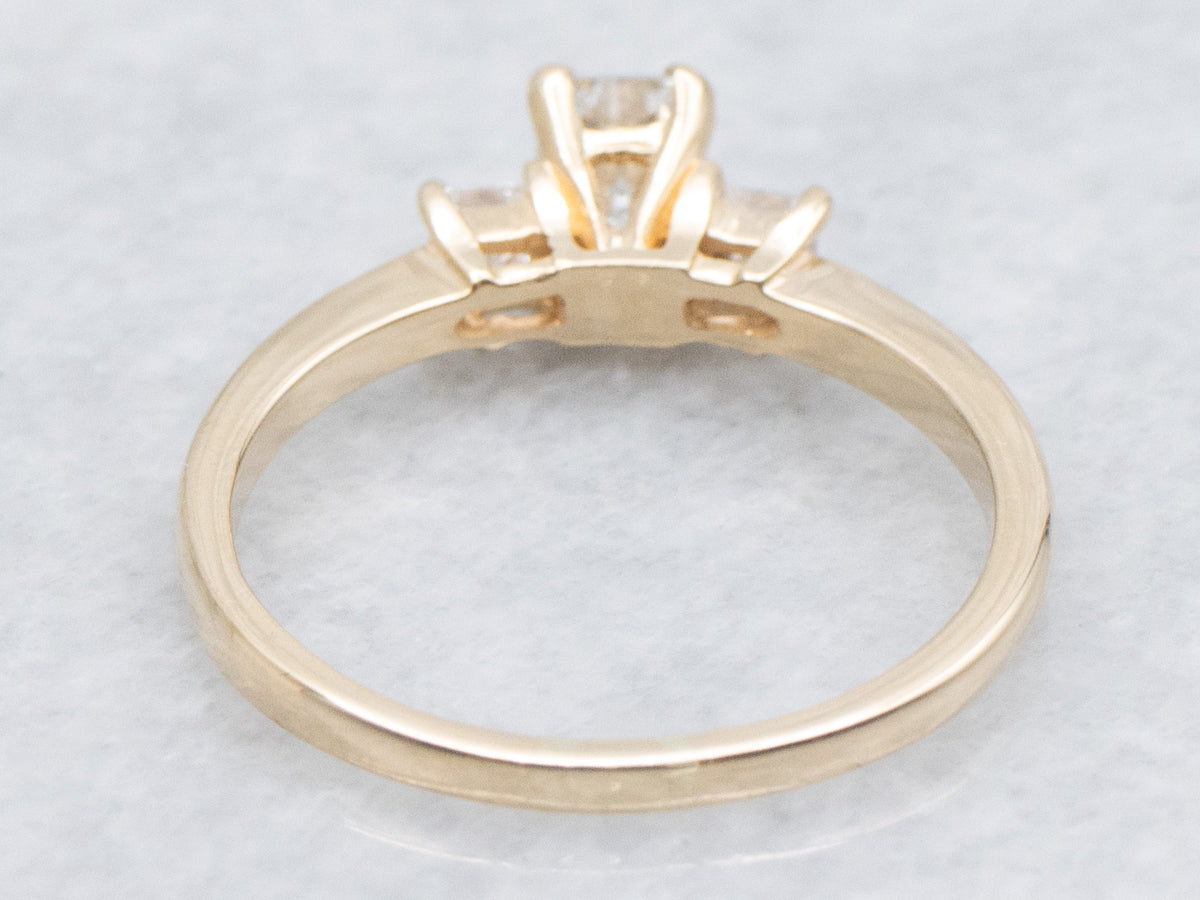 Emerald-Cut Diamond and Gold Engagement Ring