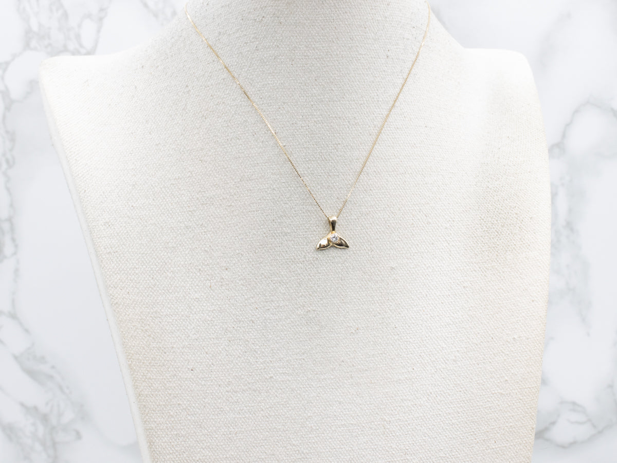 Polished Gold Whale's Tail Pendant with Diamond