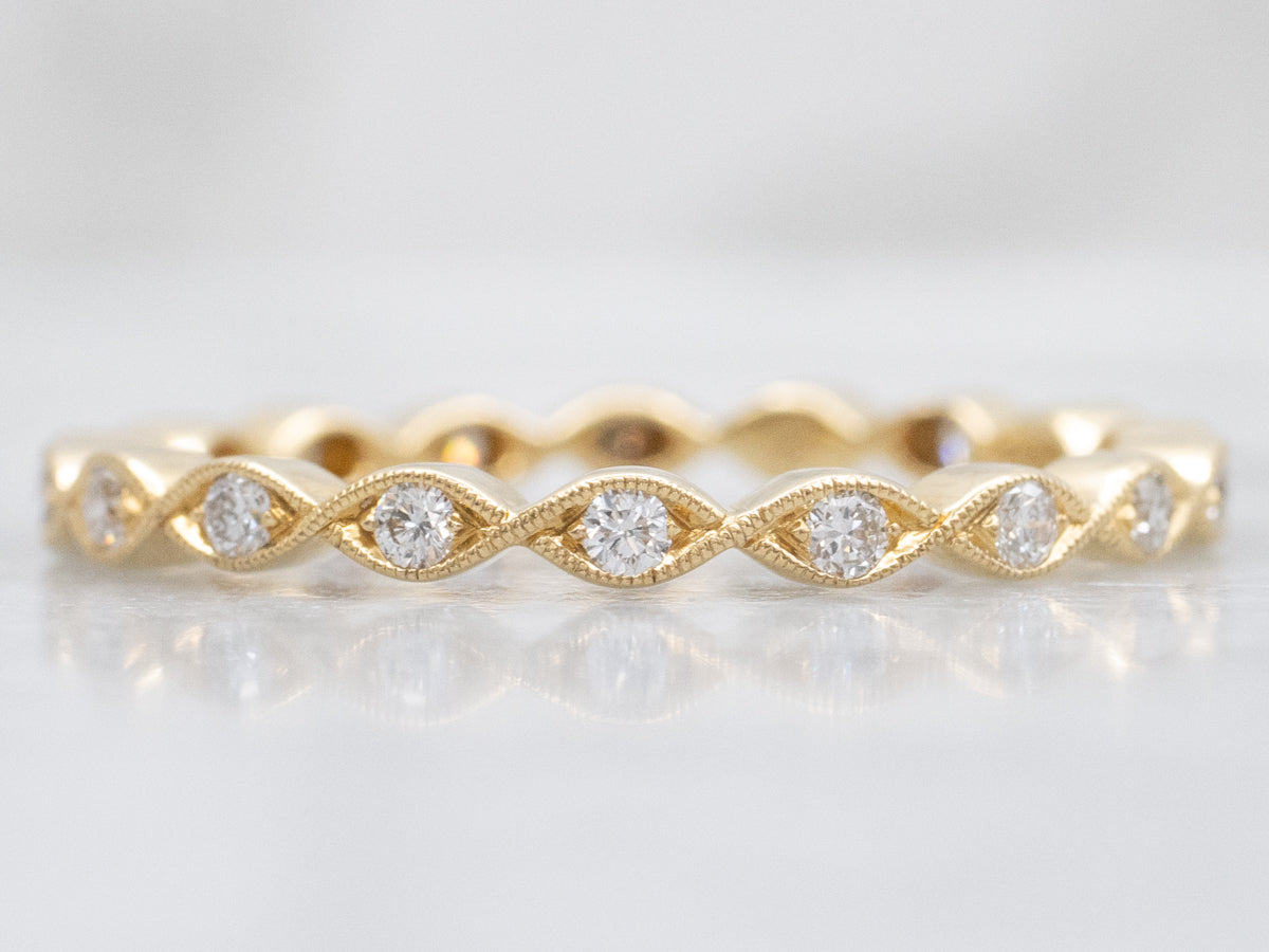 Twisting 18-Karat Gold Diamond Eternity Band