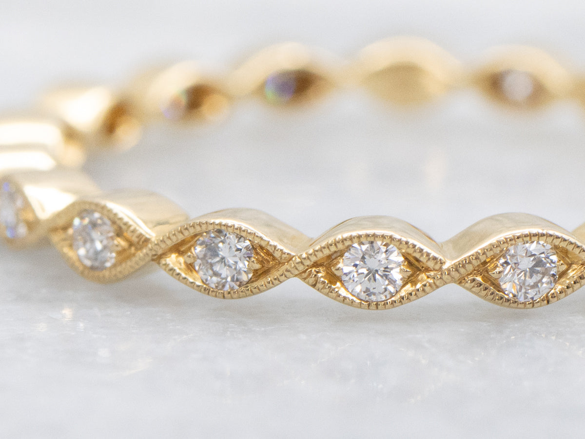 Twisting 18-Karat Gold Diamond Eternity Band