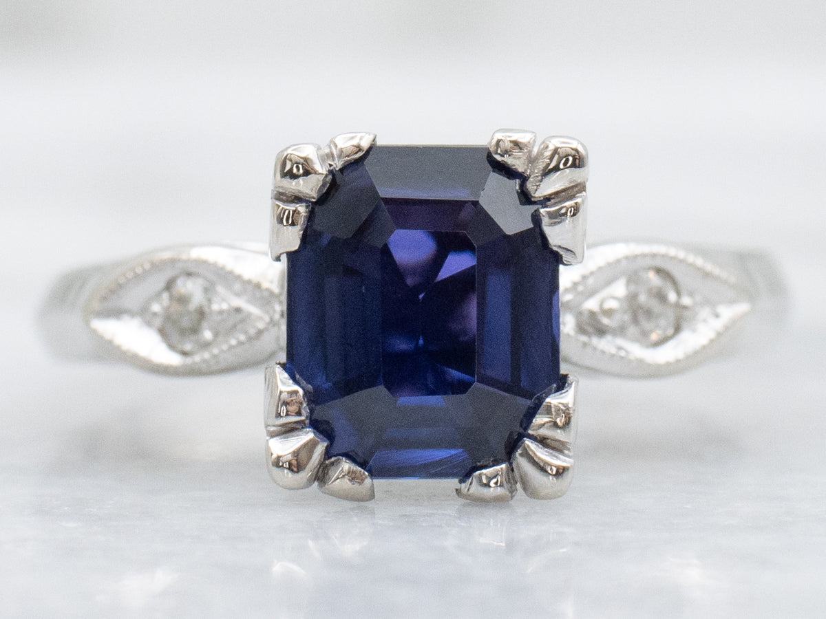 Purple Sapphire and Diamond Retro Era Engagement Ring