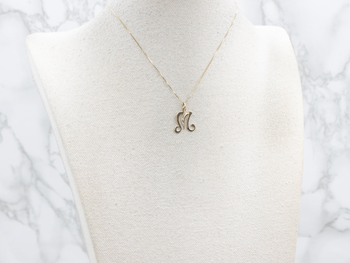 Curling Yellow Gold "M" Initial Pendant