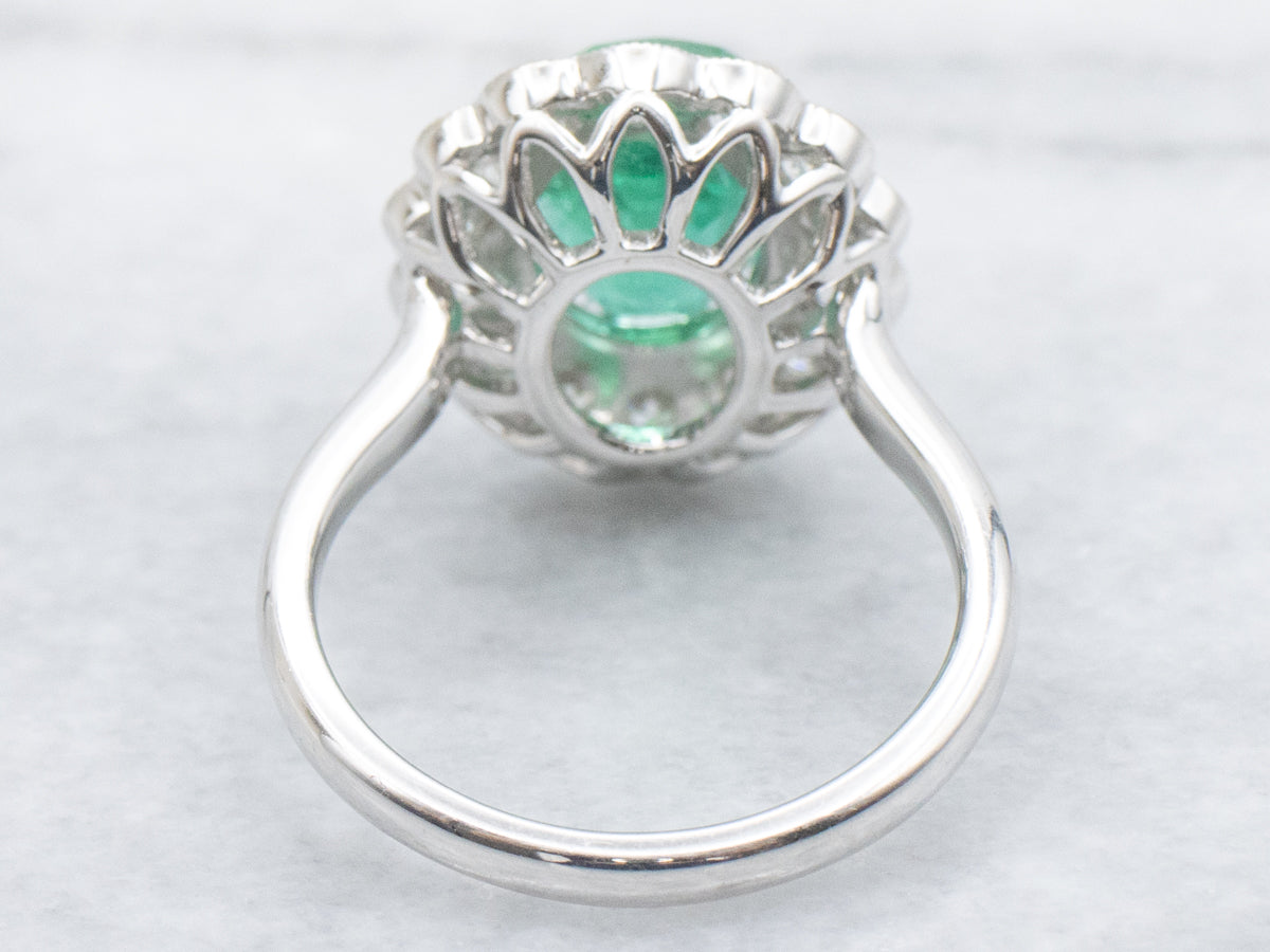 Scallop-Gold Emerald and Diamond Halo Ring