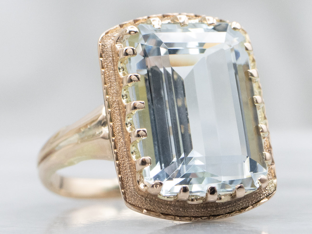 Emerald-Cut Aquamarine Textured Gold Solitaire Ring
