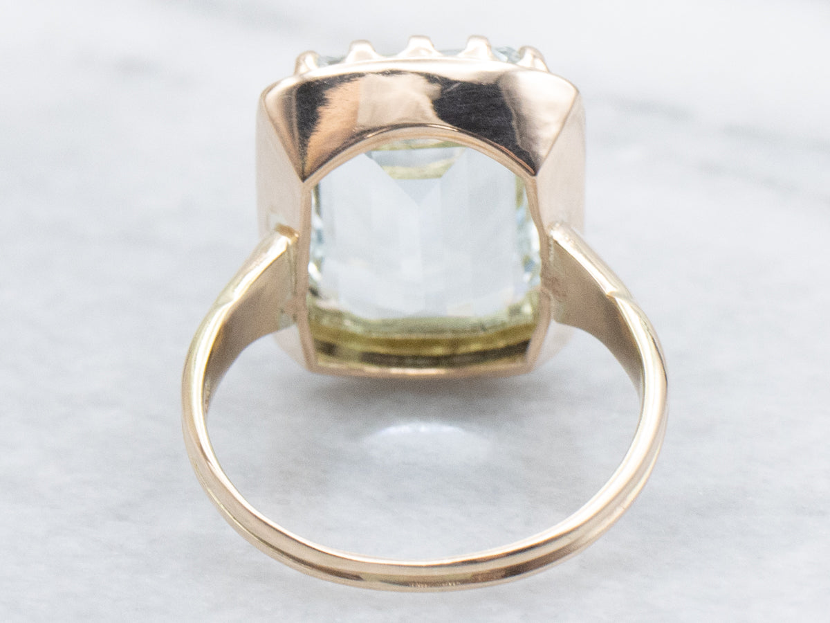 Emerald-Cut Aquamarine Textured Gold Solitaire Ring