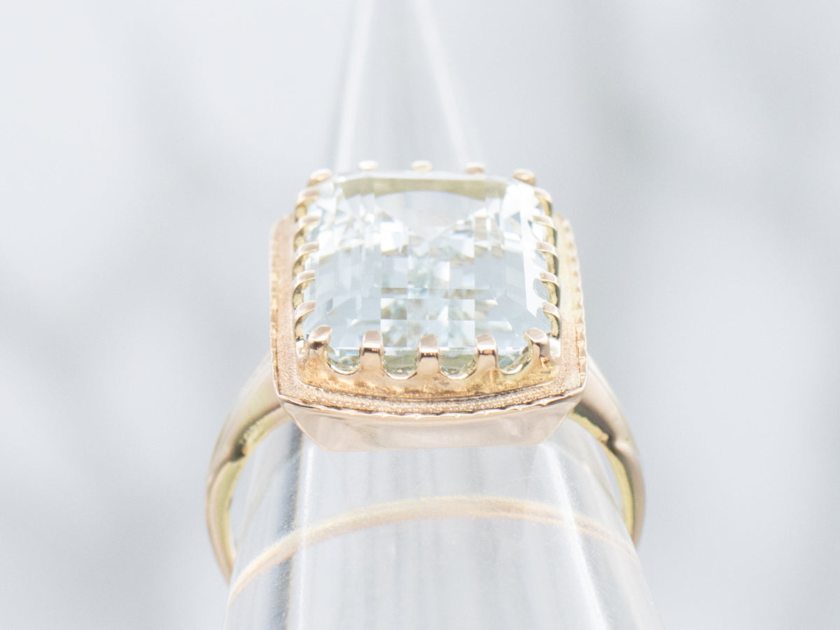 Emerald-Cut Aquamarine Textured Gold Solitaire Ring